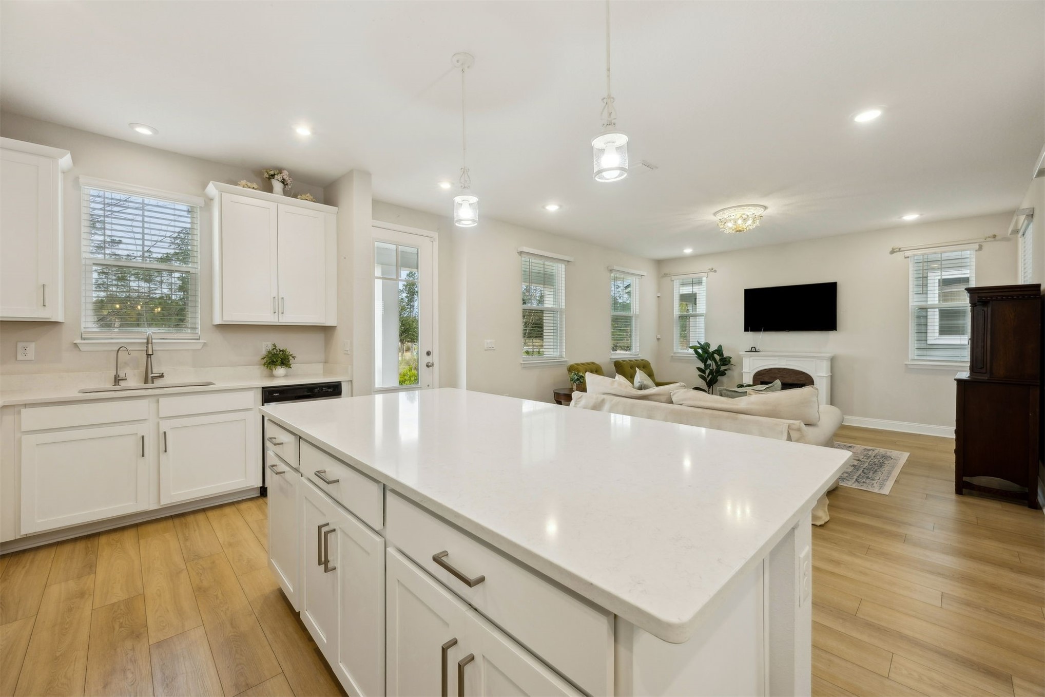 141 Redbud Lane Yulee, FL 32097 - Photo 20 of 61 a large white kitchen with a large window