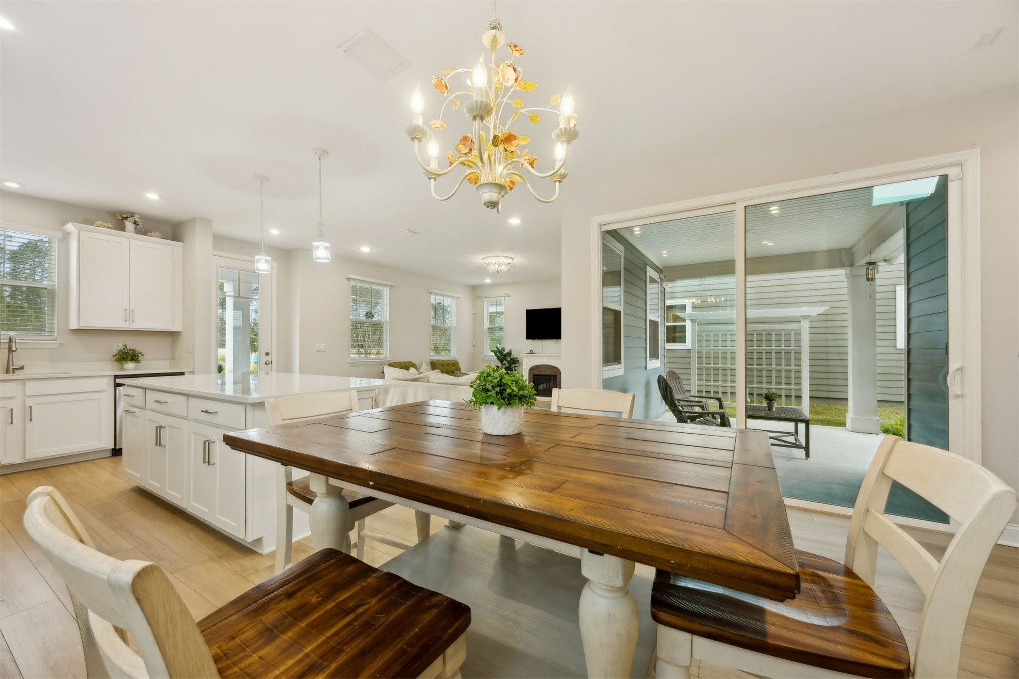141 Redbud Lane Yulee, FL 32097 - Photo 22 of 61 a view of a dining room with furniture and wooden floor