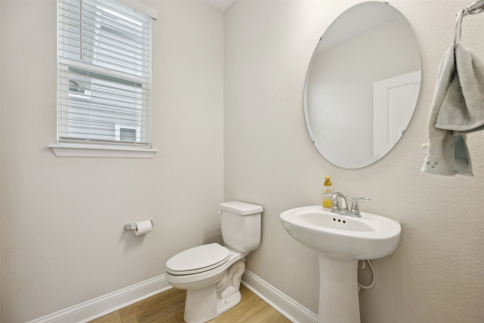 141 Redbud Lane Yulee, FL 32097 - Photo 25 of 61 a bathroom with a toilet sink and mirror
