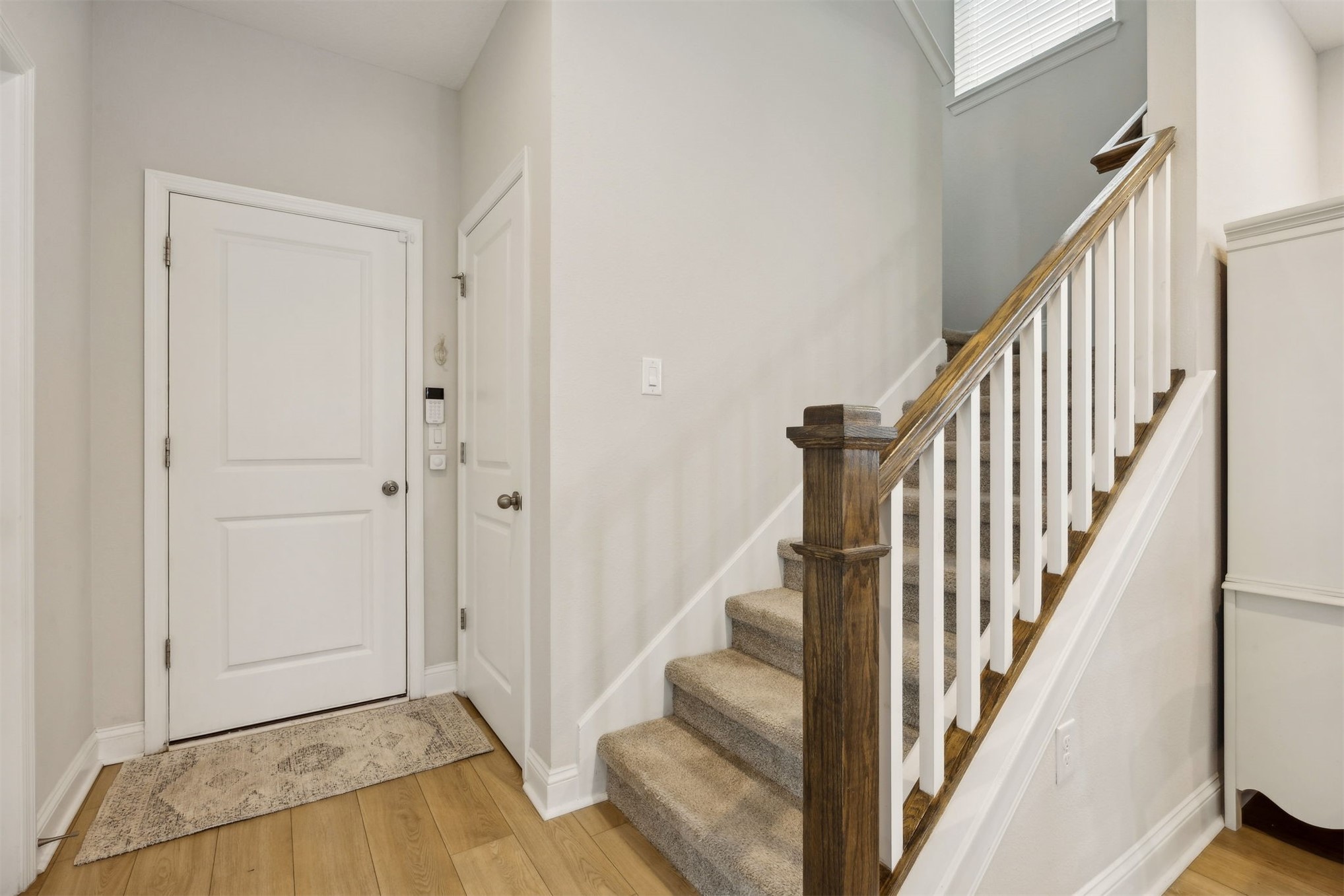 141 Redbud Lane Yulee, FL 32097 - Photo 26 of 61 a view of an entryway with staircase
