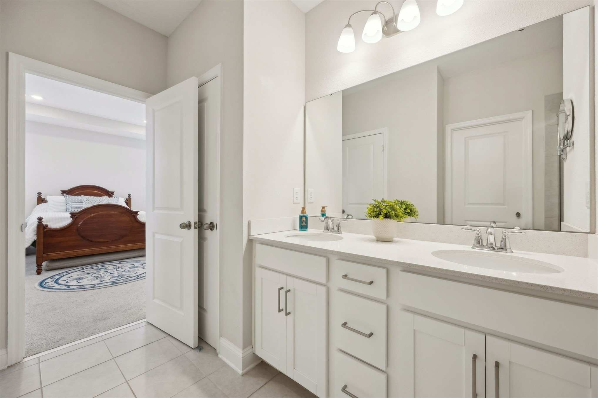 141 Redbud Lane Yulee, FL 32097 - Photo 34 of 61 a bathroom with a sink and a mirror