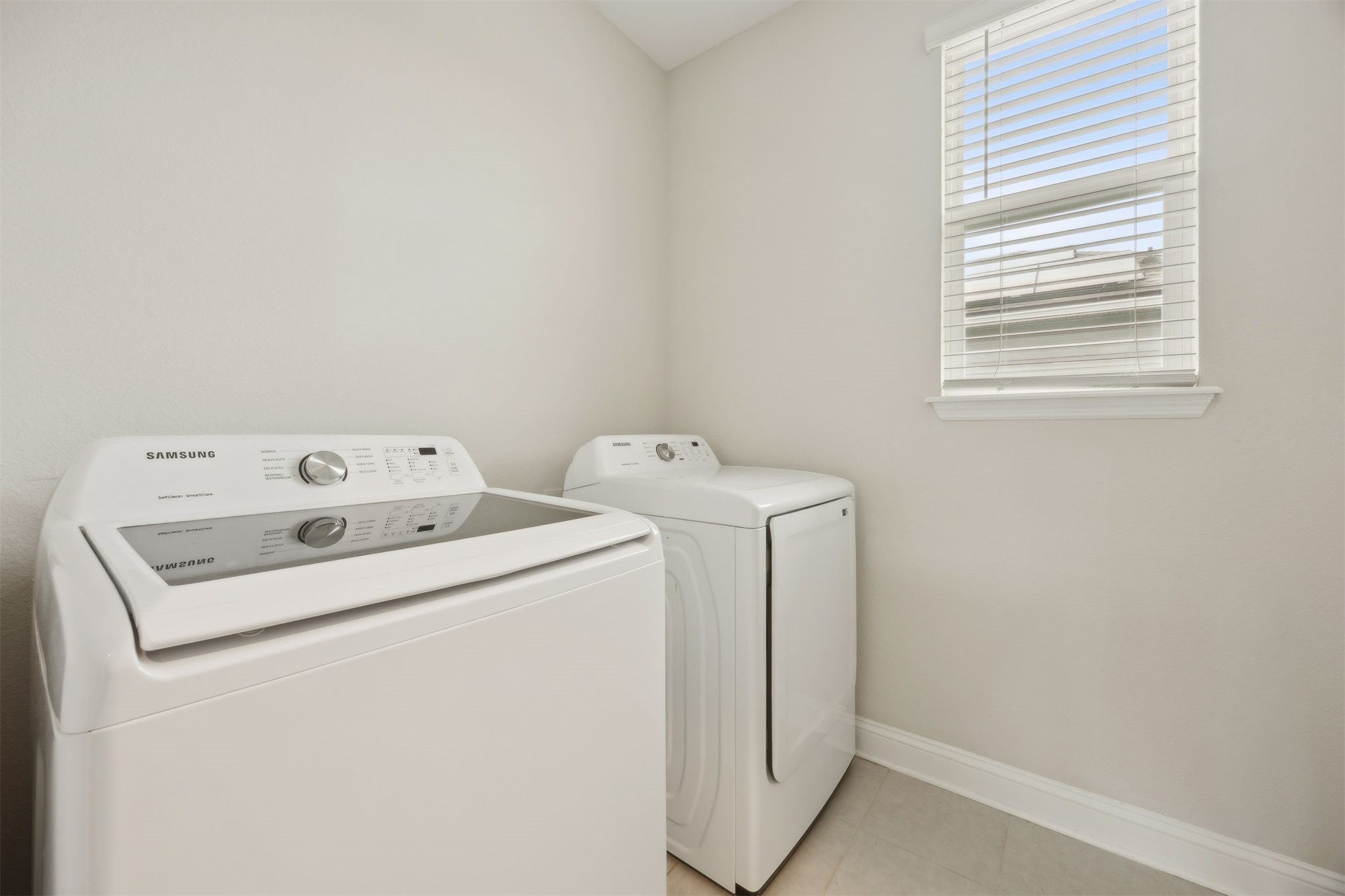 141 Redbud Lane Yulee, FL 32097 - Photo 42 of 61 a utility room with dryer and washer