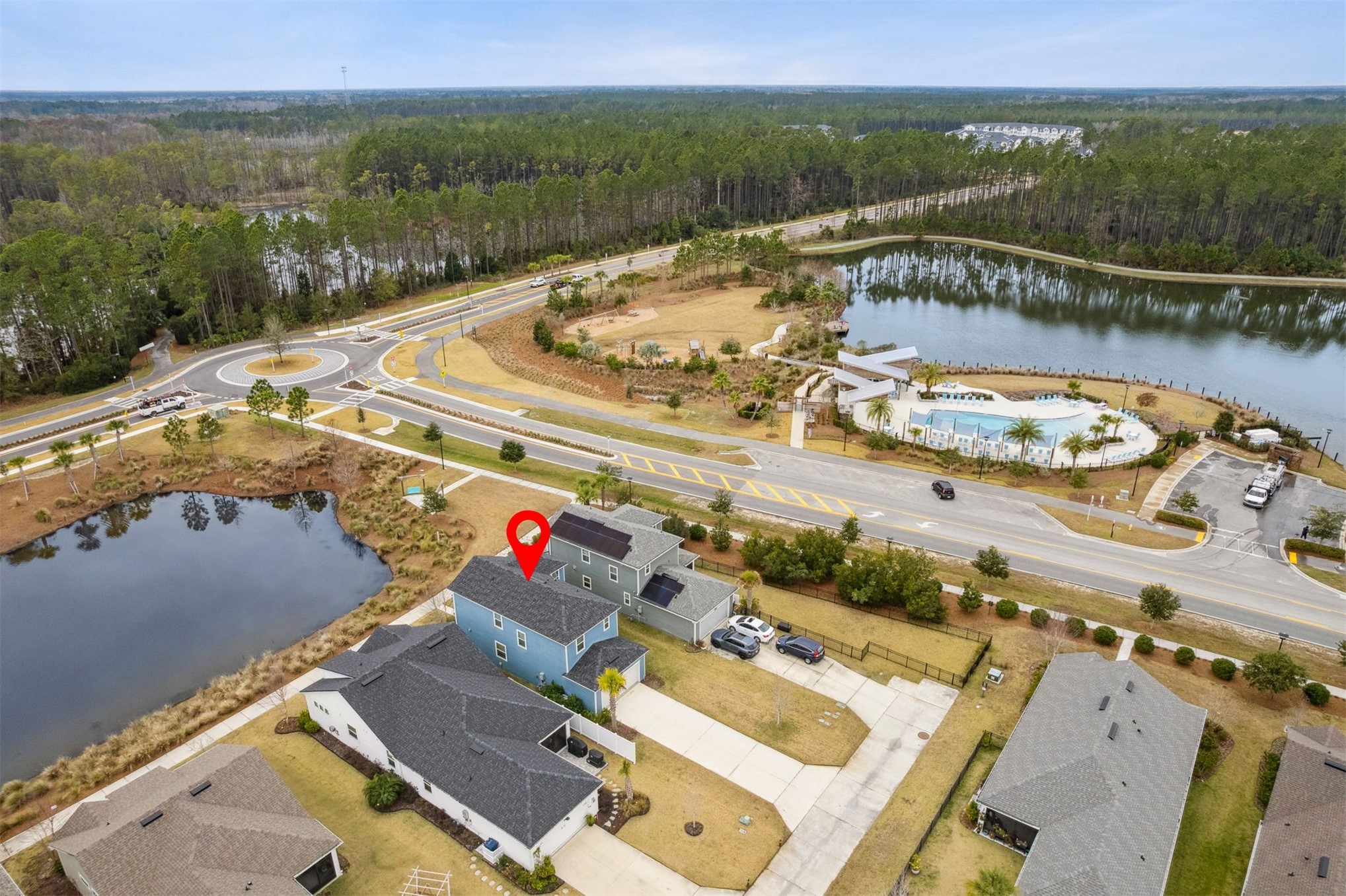 141 Redbud Lane Yulee, FL 32097 - Photo 51 of 61 an aerial view of a house with a lake view