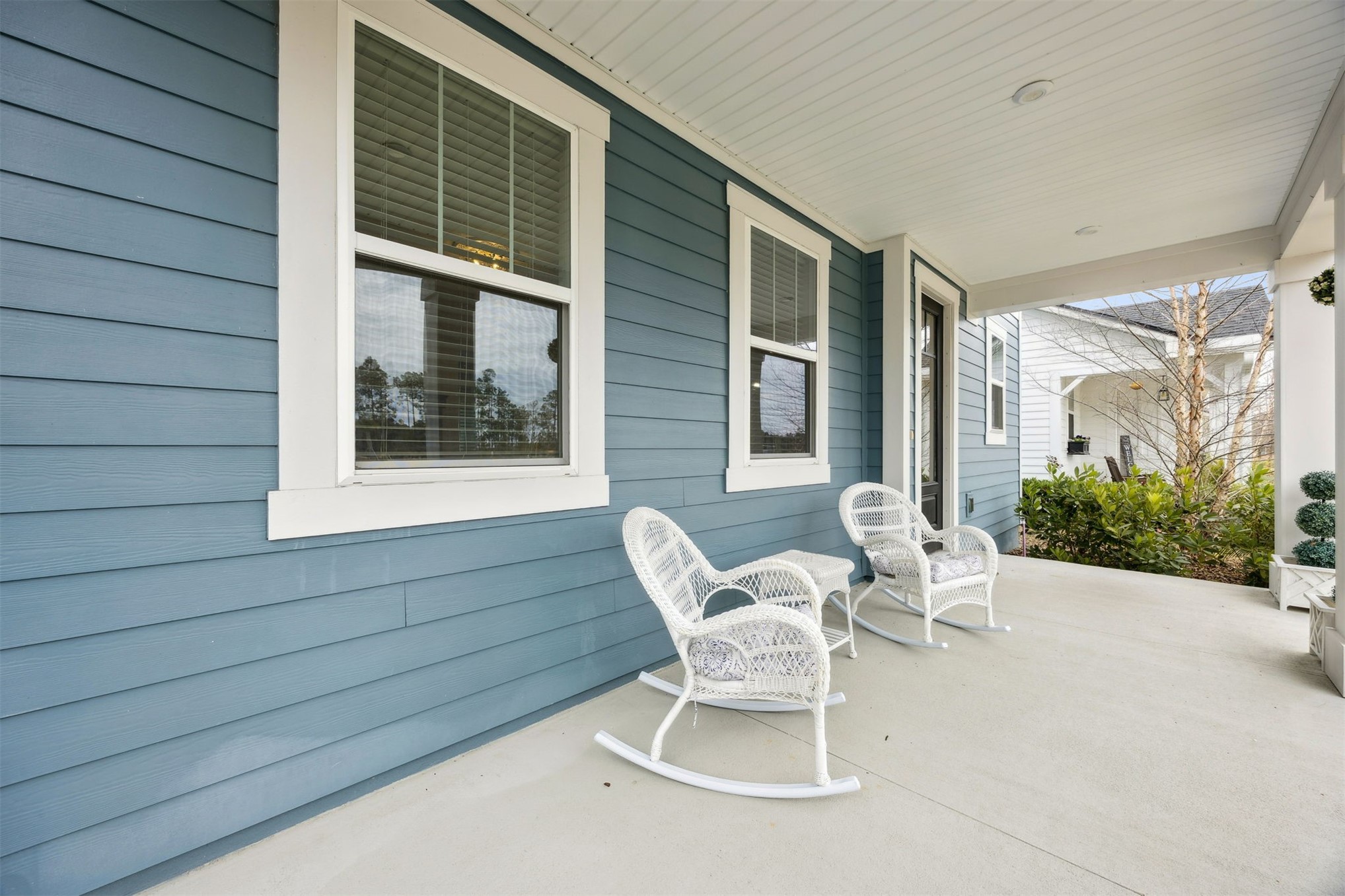 141 Redbud Lane Yulee, FL 32097 - Photo 6 of 61 a view of backyard with a chair and potted plants