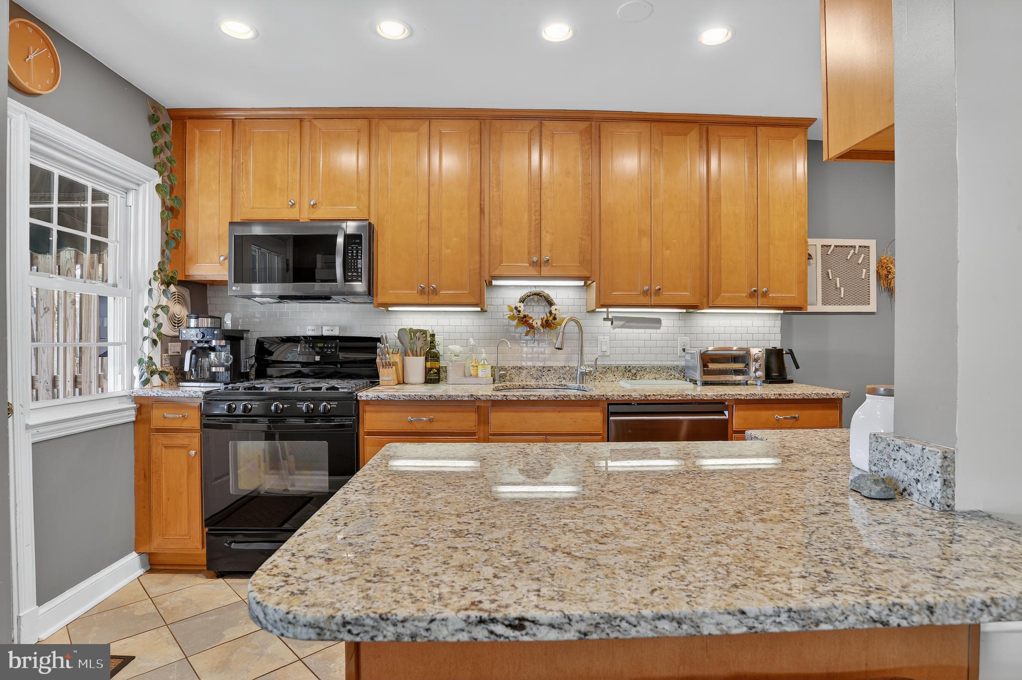 227 Overbrook Road Baltimore, MD 21212 - Photo 5 of 29 Updated Kitchen w/ Breakfast Bar