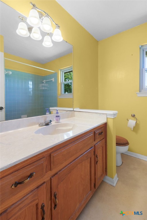 3391 Lois Lane Kempner, TX 76539 - Photo 22 of 35 a bathroom with a sink a mirror and a toilet
