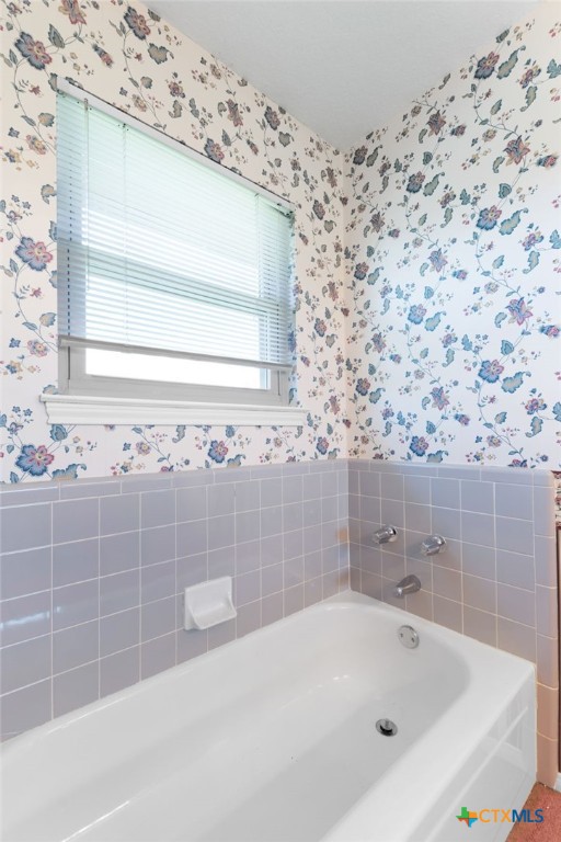 3391 Lois Lane Kempner, TX 76539 - Photo 26 of 35 a bathroom with a bathtub and shower