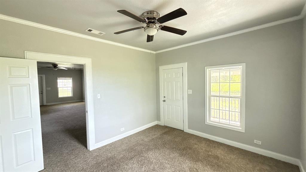 1338 State Highway 121 Bonham, TX 75418 - Photo 14 of 32 a view of an empty room with a window
