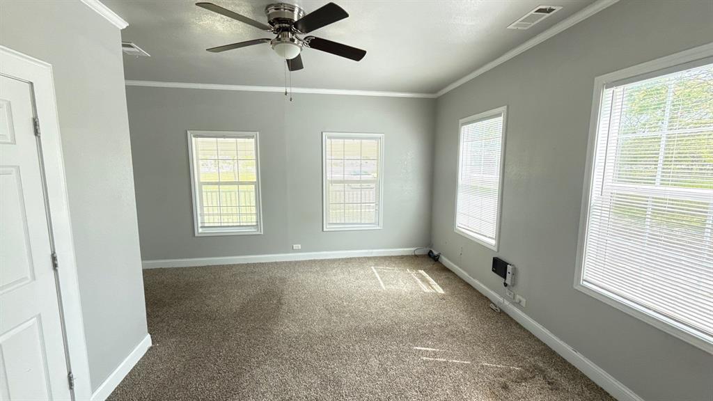 1338 State Highway 121 Bonham, TX 75418 - Photo 16 of 32 a view of an empty room with a window