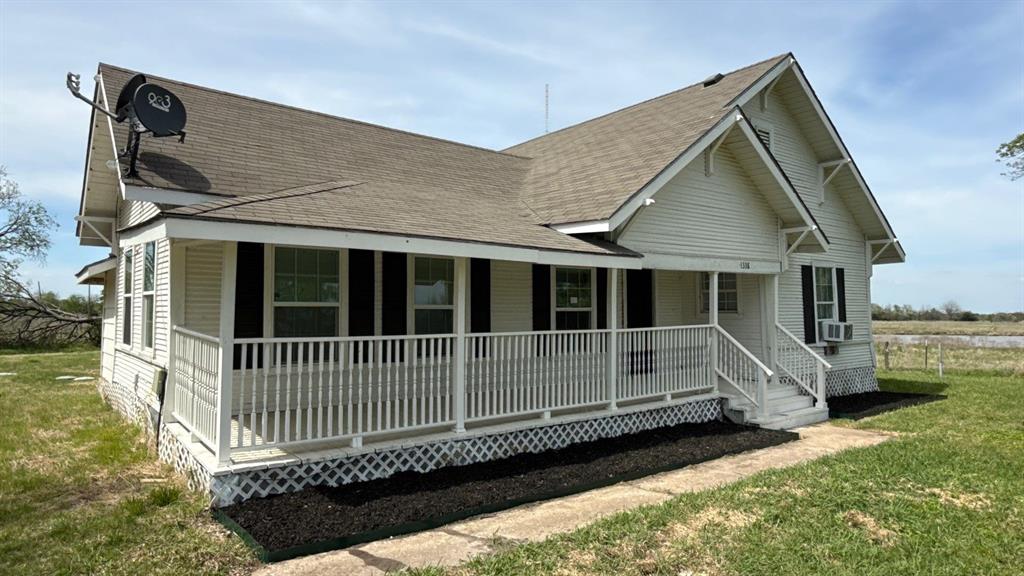 1338 State Highway 121 Bonham, TX 75418 - Photo 2 of 32 a view of house with a deck