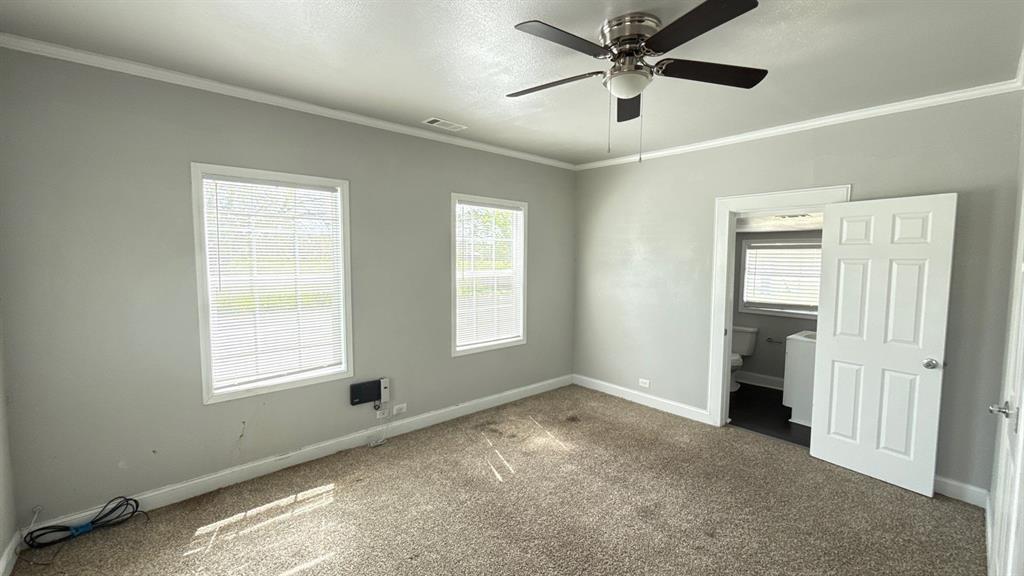 1338 State Highway 121 Bonham, TX 75418 - Photo 17 of 32 a view of an empty room with a window