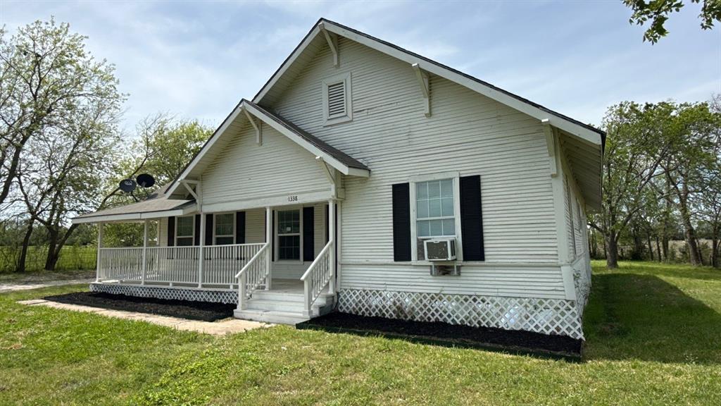 1338 State Highway 121 Bonham, TX 75418 - Photo 3 of 32 a view of house with a yard