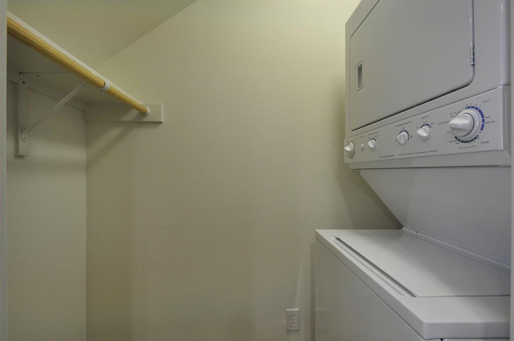 711 West 32nd Street, Unit 108 Austin, TX 78705 - Photo 27 of 28 a utility room with dryer and washer