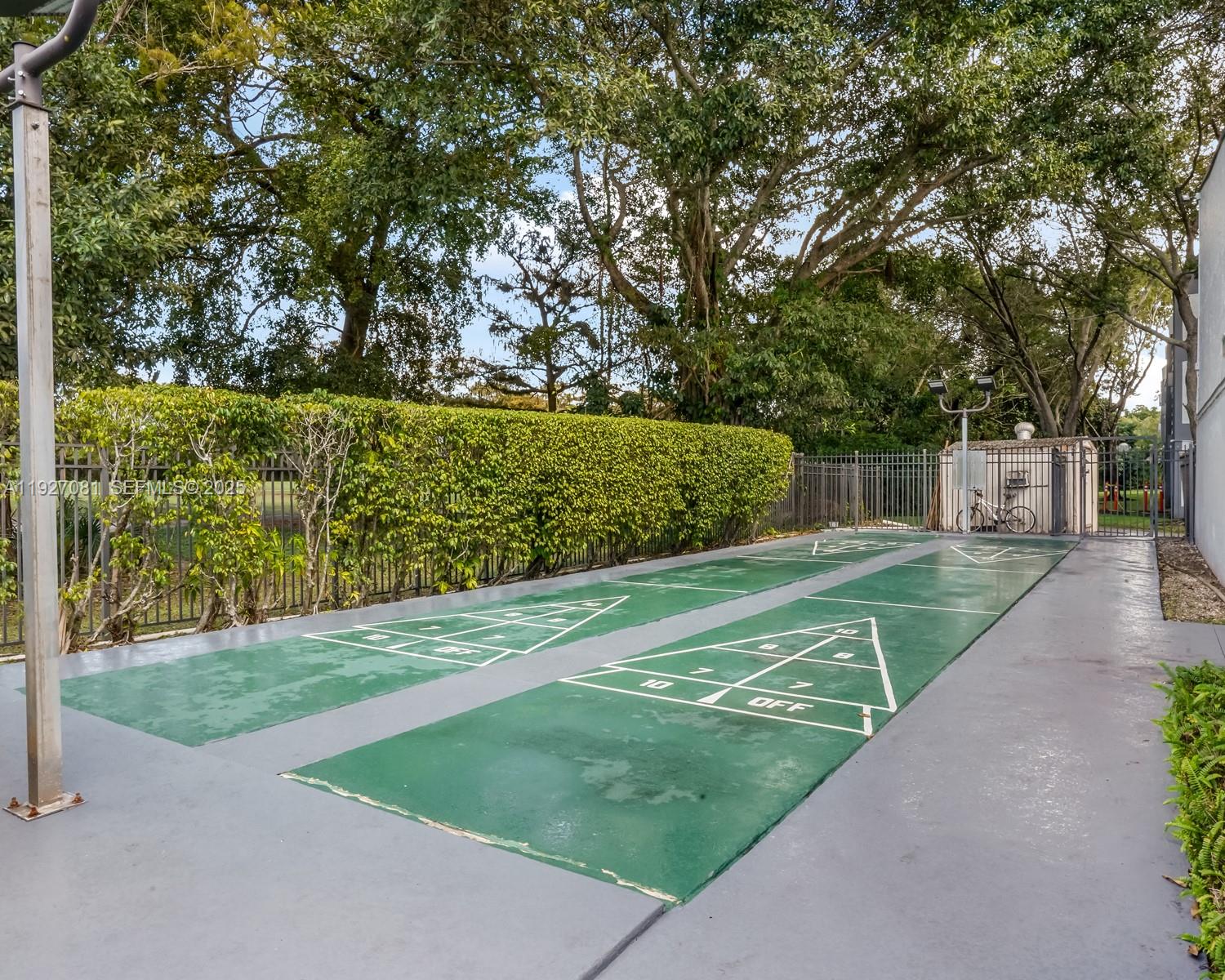 8320 Sands Point Boulevard, Unit M301 Tamarac, FL 33321 - Photo 33 of 36 a view of a park with large trees