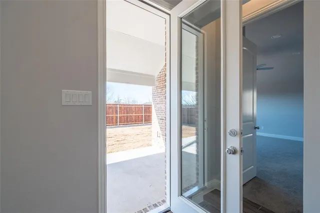 a view of a brick building with wooden floor