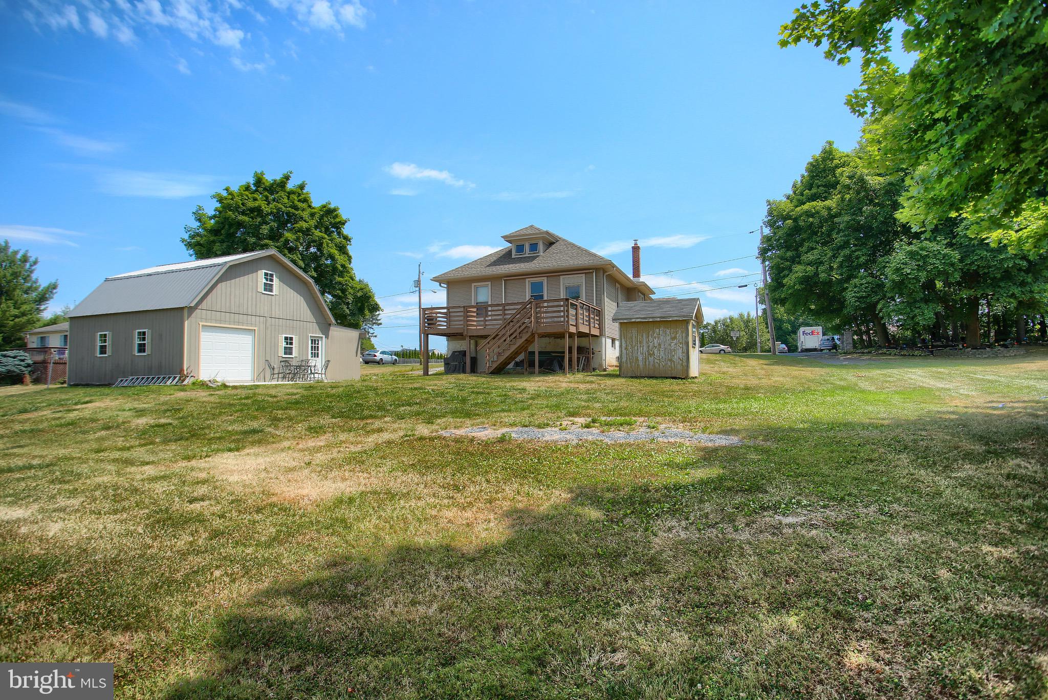 209 Chester Road Enola, PA 17025 - Photo 8 of 35 View from yard to garage & deck
