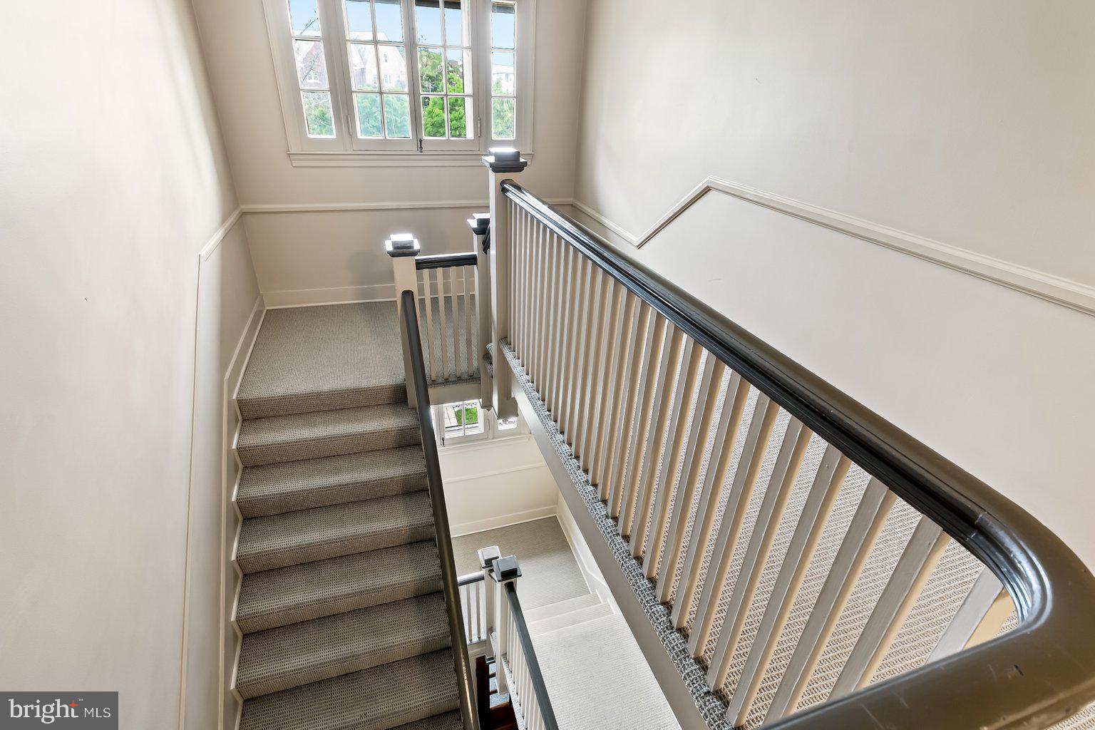 610 Somerset Road, Unit 302 Baltimore, MD 21210 - Photo 4 of 35 center staircase to the unit