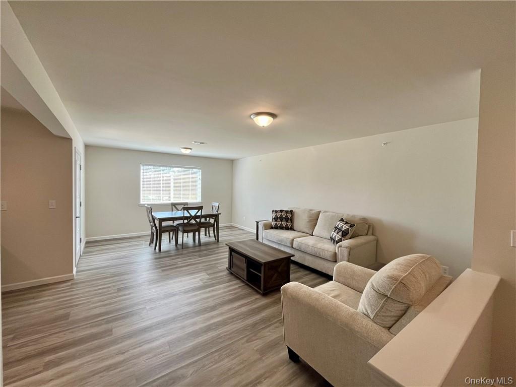 206 Golf Links Road, Unit 821 Middletown, NY 10940 - Photo 3 of 7 Living room with hardwood / wood-style flooring
