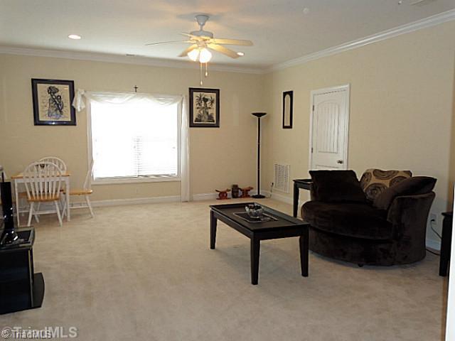 1452 Downington Road Clemmons, NC 27012 - Photo 12 of 16 Den/Family/Great Room. Large upper level den or playroom has recessed lighting, ceiling fan, walk in attic space and pull down stairs.