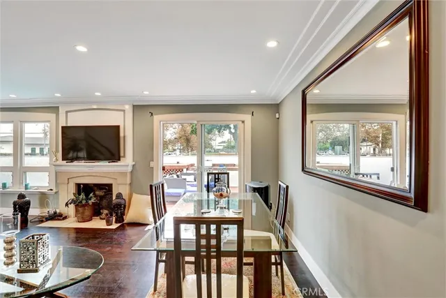 a living room with furniture fireplace and a flat screen tv