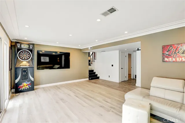 a bedroom with furniture and window