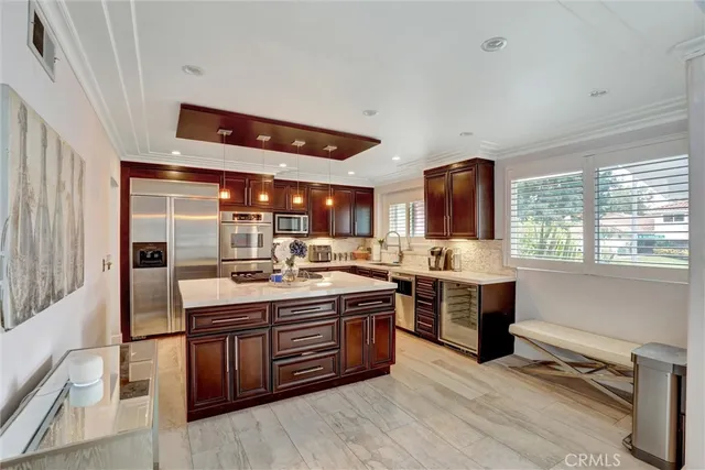 a kitchen with a stove and a sink