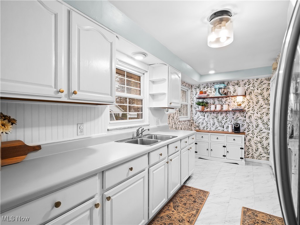693 Avon Belden Road Avon Lake, OH 44012 - Photo 12 of 36 Kitchen featuring white cabinetry
