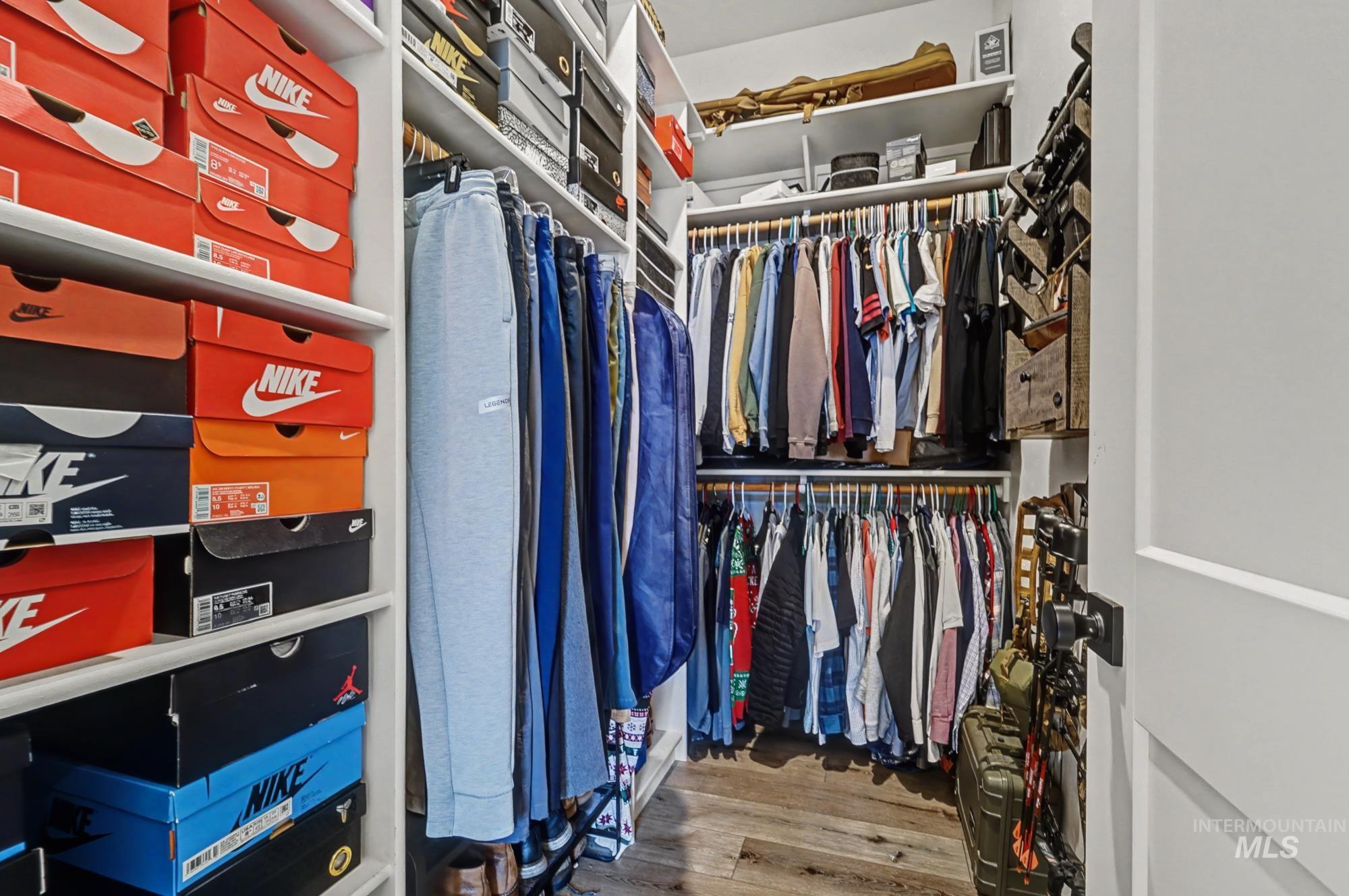 18357 North Burnt Car Way Boise, ID 83714 - Photo 31 of 48 Walk in closet featuring light wood finished floors