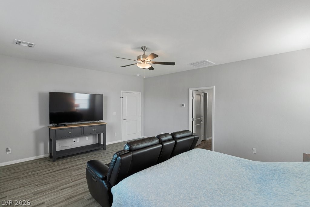 4191 Velvet View Street Las Vegas, NV 89129 - Photo 16 of 44 Bedroom featuring wood finished floors and a ceiling fan