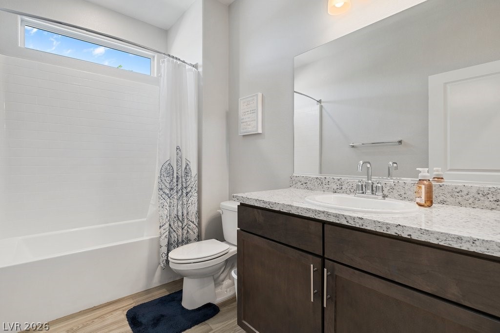 4191 Velvet View Street Las Vegas, NV 89129 - Photo 20 of 44 Full bath with vanity, shower / bath combo, and light wood-style floors