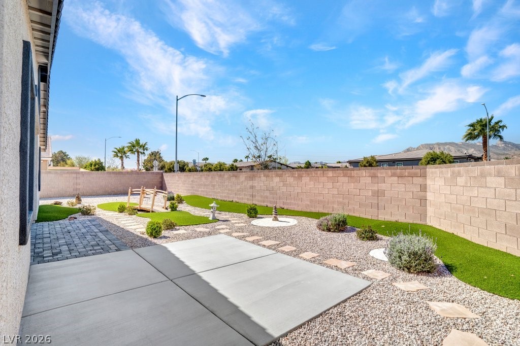 4191 Velvet View Street Las Vegas, NV 89129 - Photo 28 of 44 Fenced backyard featuring a patio area