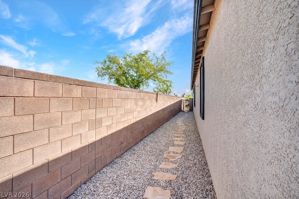 4191 Velvet View Street Las Vegas, NV 89129 - Photo 30 of 44 View of property exterior with stucco siding