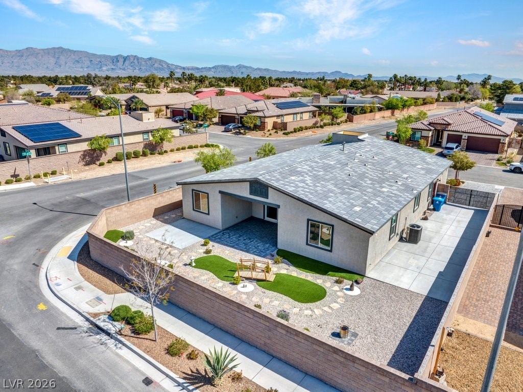 4191 Velvet View Street Las Vegas, NV 89129 - Photo 34 of 44 Aerial perspective of suburban area with a mountain backdrop