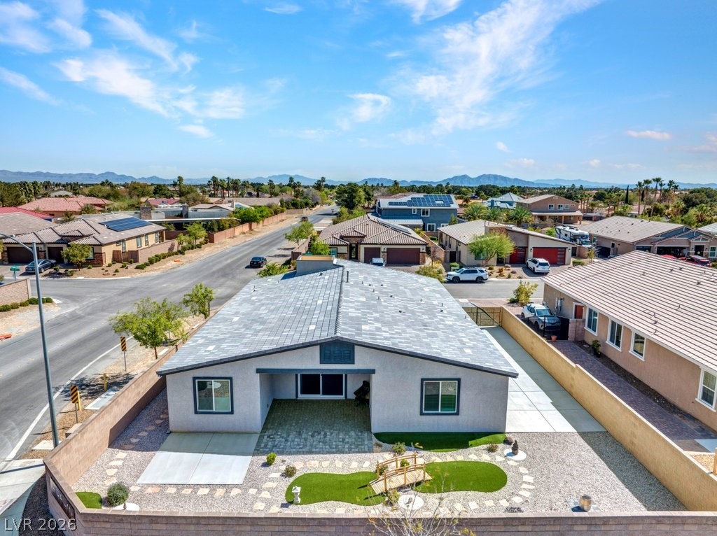 4191 Velvet View Street Las Vegas, NV 89129 - Photo 36 of 44 Aerial perspective of suburban area featuring a mountain backdrop