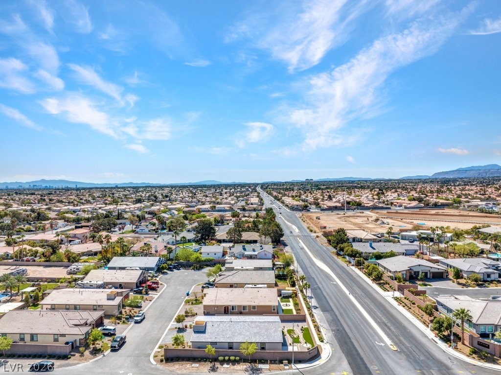 4191 Velvet View Street Las Vegas, NV 89129 - Photo 38 of 44 Aerial view of residential area with a mountainous background