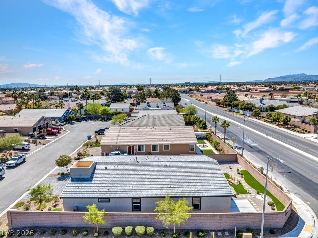 4191 Velvet View Street Las Vegas, NV 89129 - Photo 39 of 44 Aerial view of residential area featuring mountains