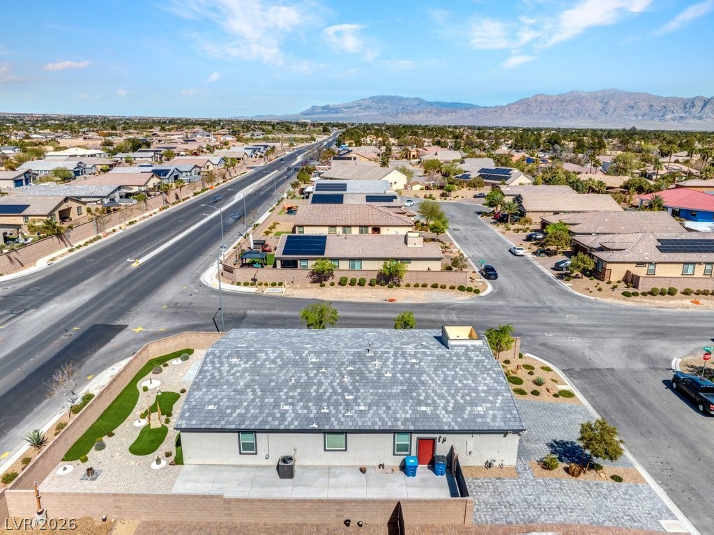 4191 Velvet View Street Las Vegas, NV 89129 - Photo 40 of 44 Aerial view of residential area with a mountainous background