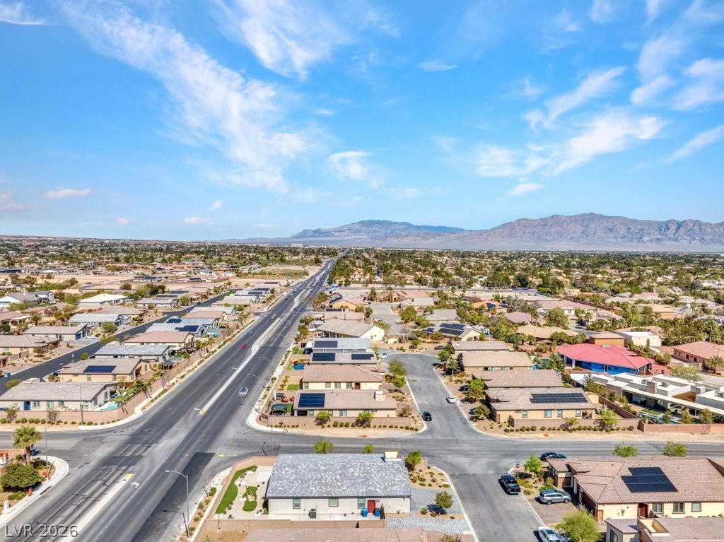 4191 Velvet View Street Las Vegas, NV 89129 - Photo 42 of 44 Aerial view of residential area with a mountainous background