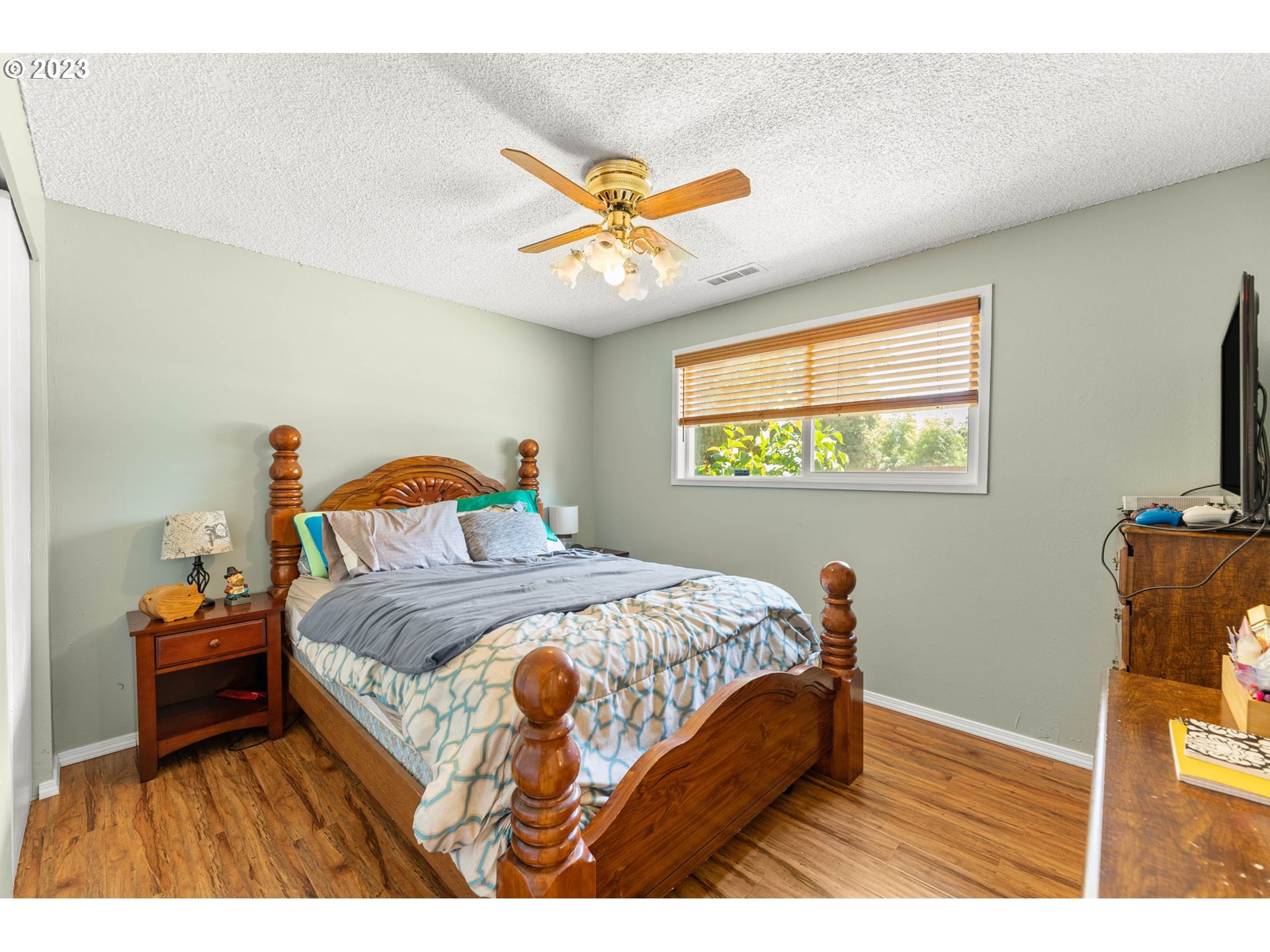 12204 Northeast 7th Street Vancouver, WA 98684 - Photo 14 of 30 a bedroom with a bed and a tv