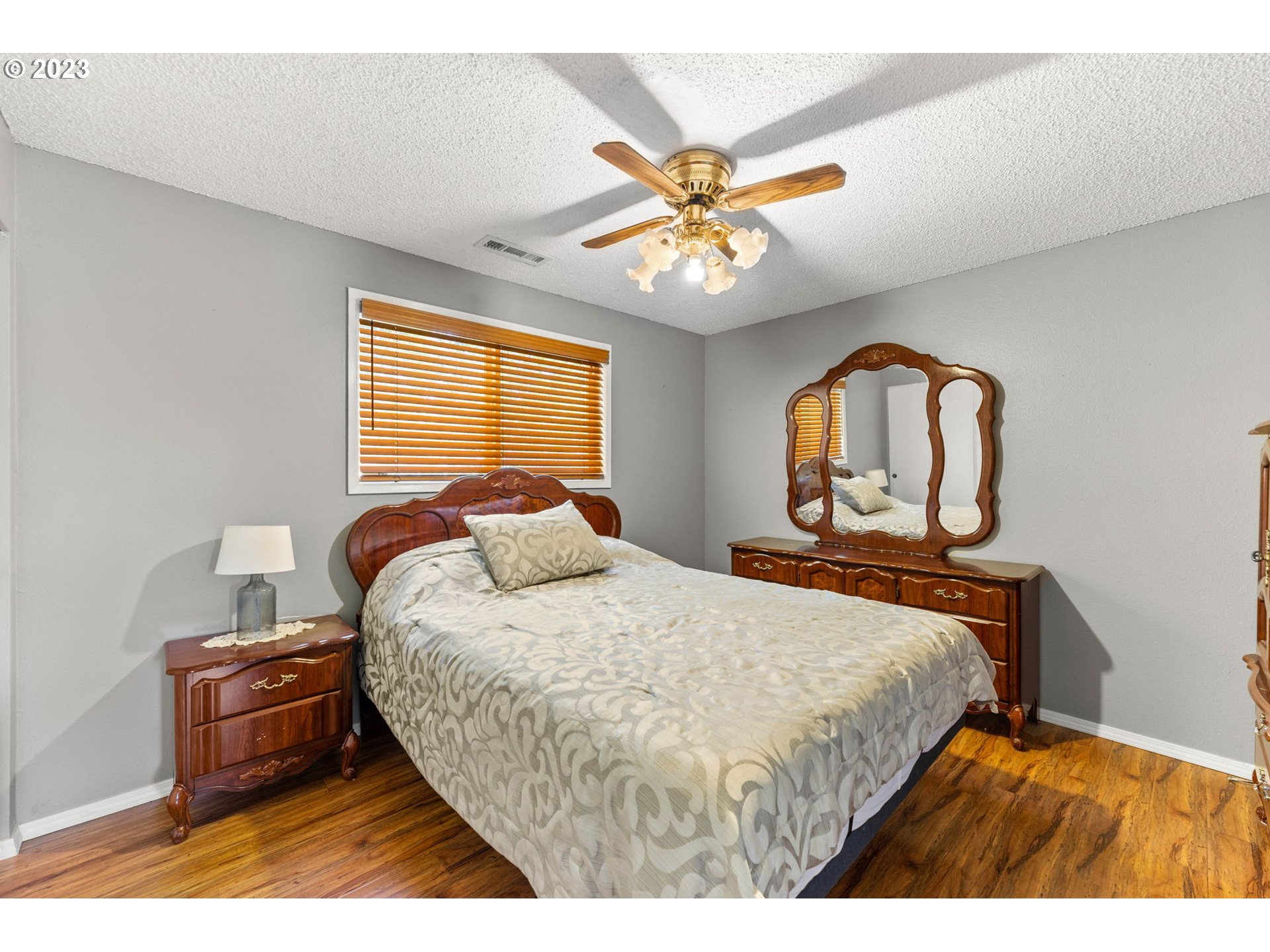 12204 Northeast 7th Street Vancouver, WA 98684 - Photo 16 of 30 a bedroom with a bed and window