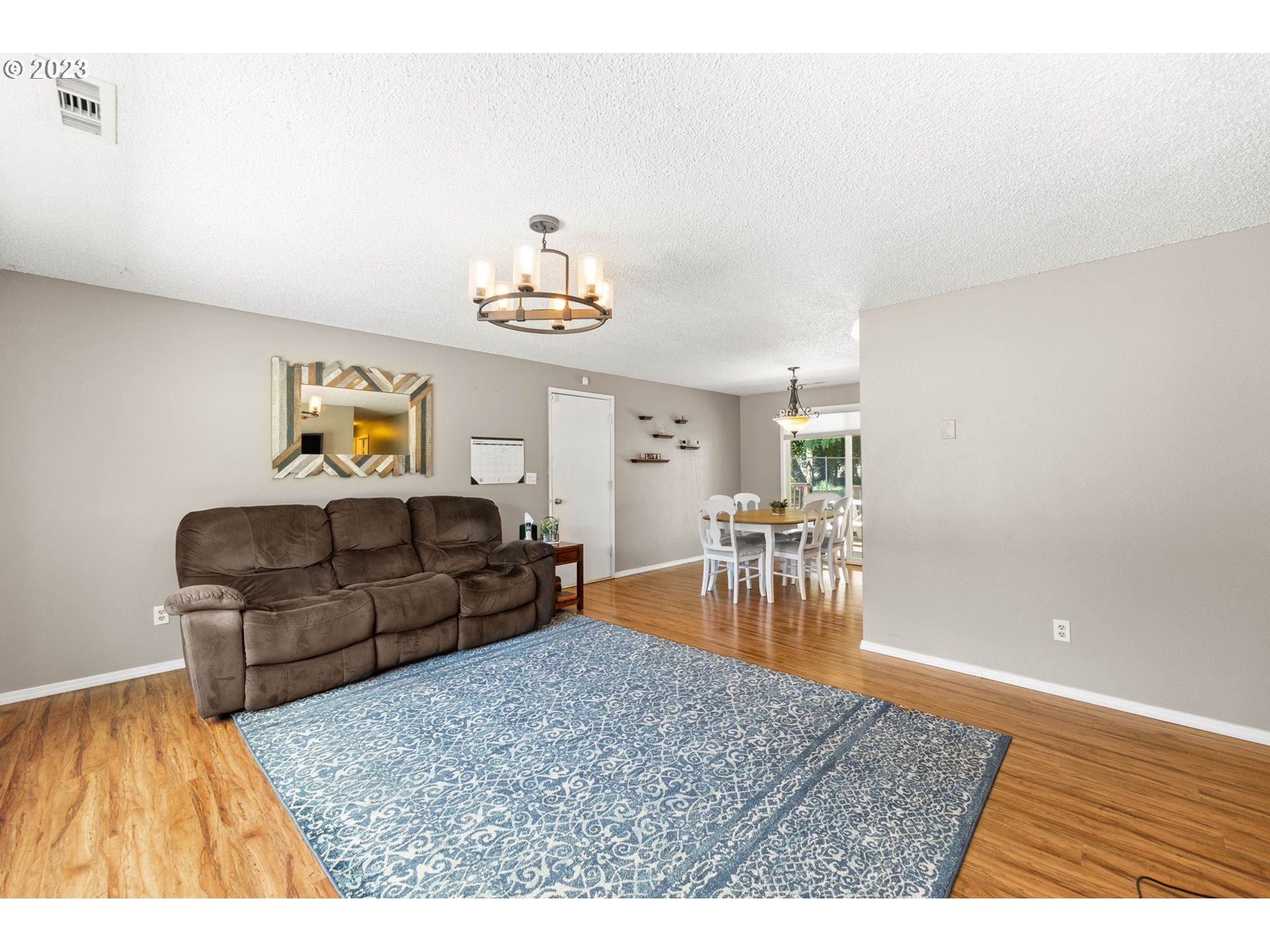 12204 Northeast 7th Street Vancouver, WA 98684 - Photo 2 of 30 a living room with furniture and wooden floor