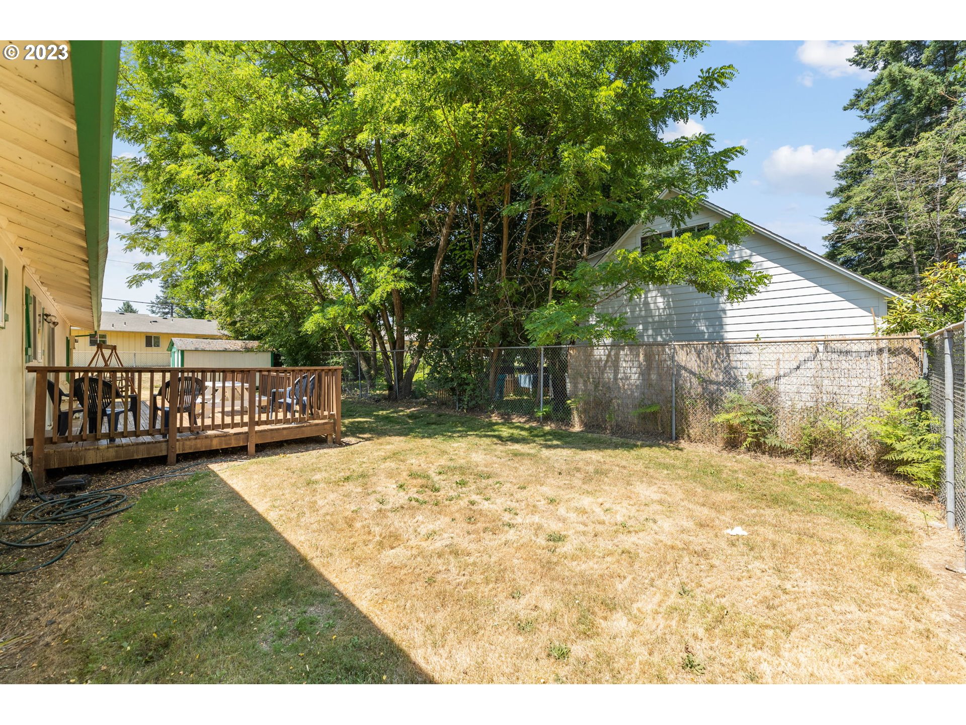 12204 Northeast 7th Street Vancouver, WA 98684 - Photo 26 of 30 a backyard of a house with a yard and seating space