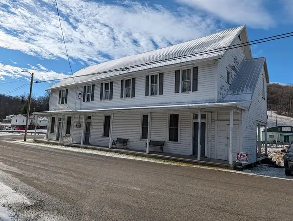 a view of a building with a street