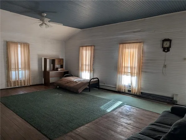 a living room with furniture and window