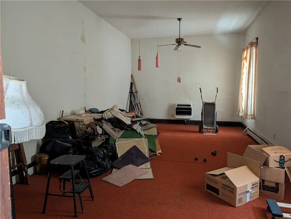 a room with gym equipment and a mirror