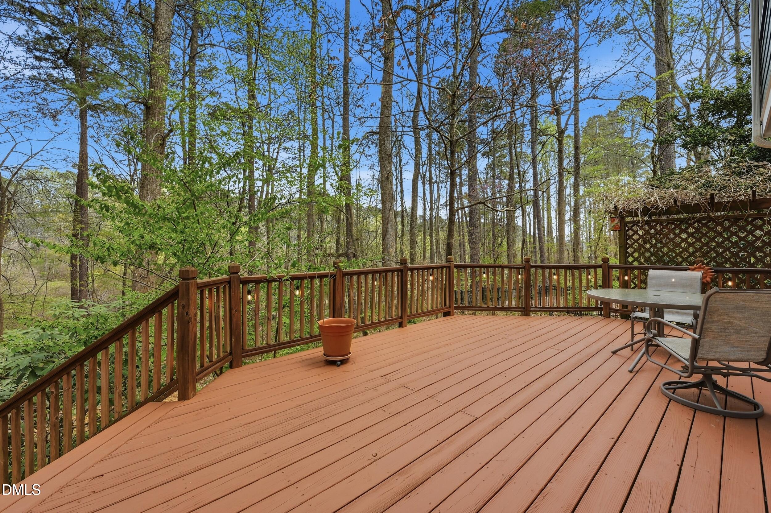 4001 Stemmons Court Raleigh, NC 27613 - Photo 31 of 45 a view of balcony with wooden floor and seating space