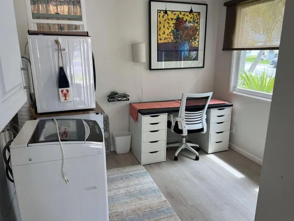 a room that has a bed and a chair
