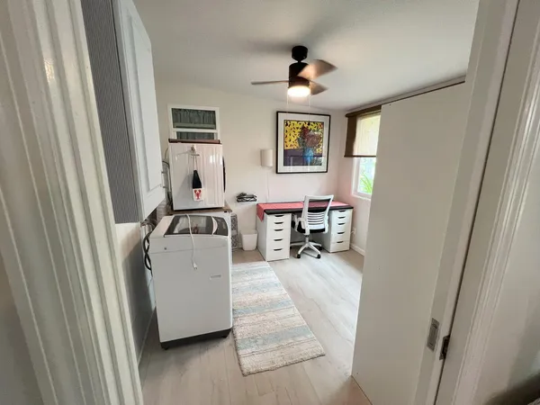 a room with furniture and a window