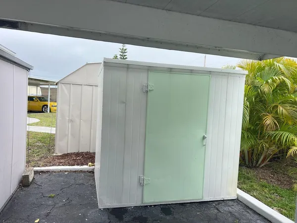 a view of a back yard from a room