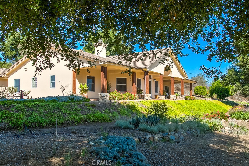 40635 De Luz Road Fallbrook, CA 92028 - Photo 16 of 75 a front view of a house with a yard